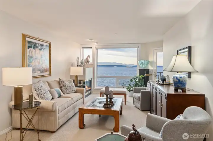 You’ll quickly become the favorite gathering spot among friends once they discover your new home features nearly floor-to-ceiling windows showcasing jaw-dropping Puget Sound and mountain views—a show-stopping backdrop that’s impossible to forget.