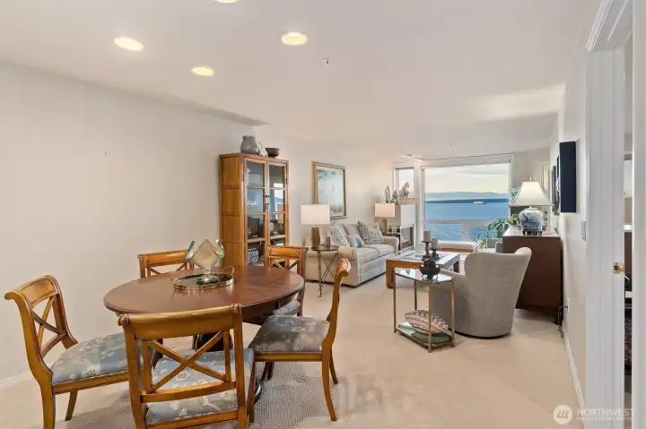 The dining area flows seamlessly into the living room, creating an open, inviting space that’s perfect for entertaining and gathering with ease.