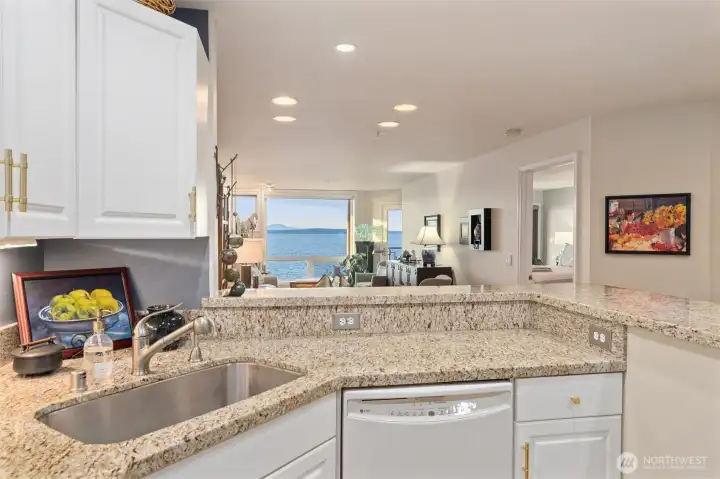 Enjoy jaw-dropping views of Puget Sound even while doing the dishes—a daily reminder that this home turns everyday moments into extraordinary ones.