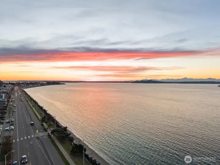The Alki Trail - a scenic walking and biking path along the waterfront - runs right along Alki Ave SW and the beach, offering miles of easy paved routes perfect for strolls, rollerblading, or cycling with beautiful Puget Sound and Olympic Mountain views just steps from home.