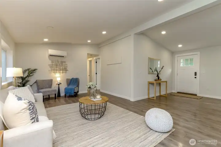 Hallway leads to office, two extra bedrooms and a full bathroom.