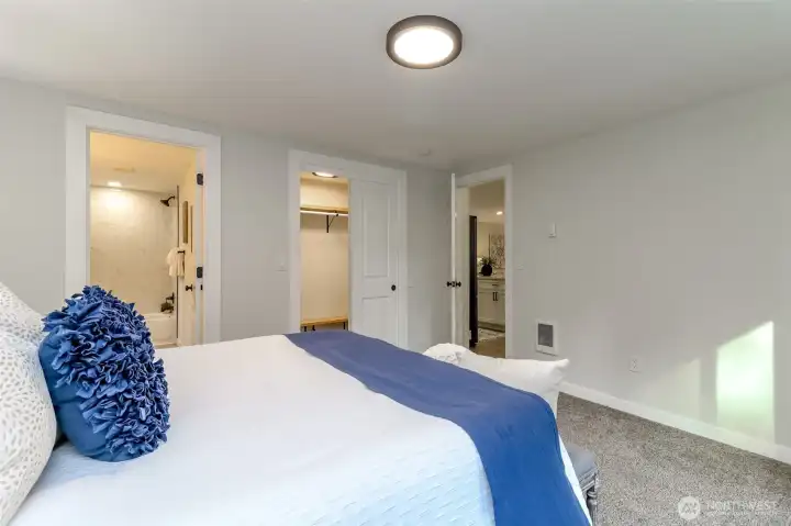 This angle from the primary bedroom facing the kitchen and dining room.