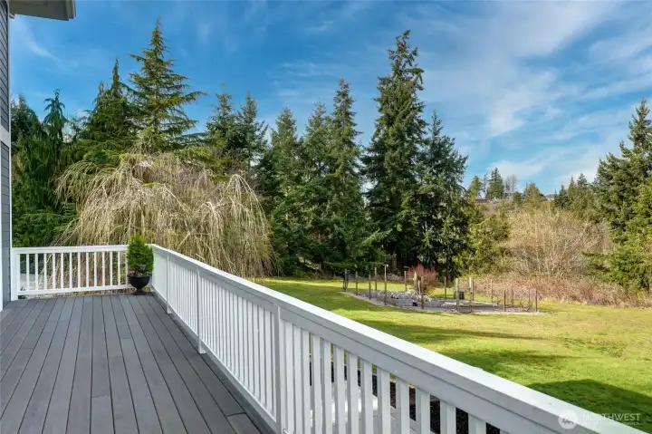 Another large deck area overlooking the garden beds and vinyard. The deck has been beautifully maintained and has a composite decking for easy maintenance.