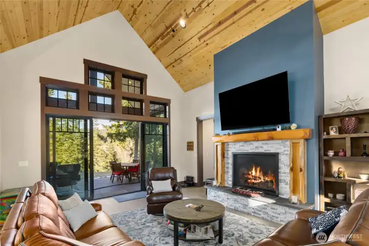 Great Room with cozy fireplace and t&g ceiling