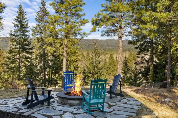 Outdoor firepit off the back of the home