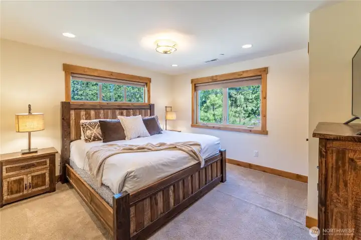 Bright and inviting third king bedroom filled with natural light.