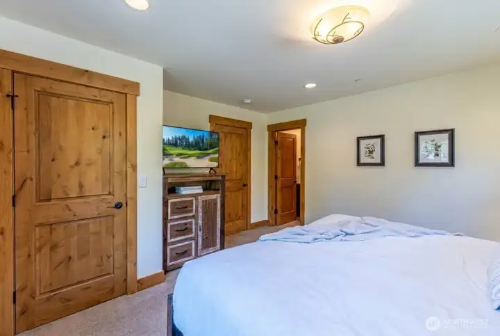 Light-filled third king bedroom offering a bright and airy retreat