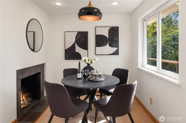 This expandable dining room has it's own fireplace, built-in speakers and western exposure.