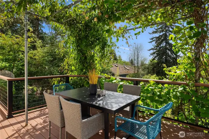 The lovely arbor frames your dining experience in lovely greenery.