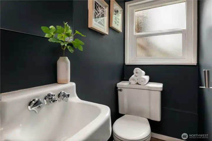 The lower level half bath has room to expand if desired.