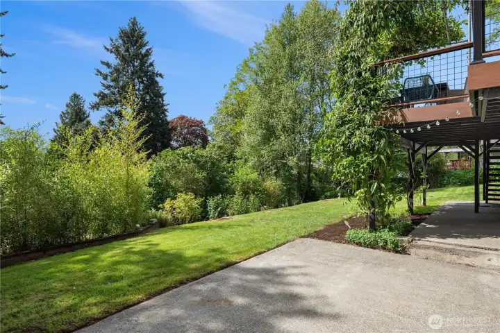 Just off this large patio area is a fantastic shop area or storage room located under the garage.