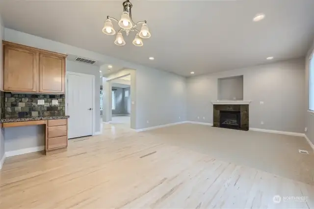 Adjacent rec room to kitchen with gas fireplace