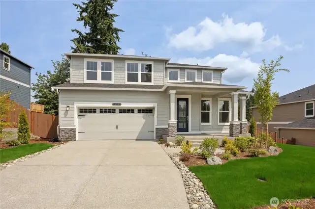 Photo is of actual home and large, private backyard under construction and on sale.