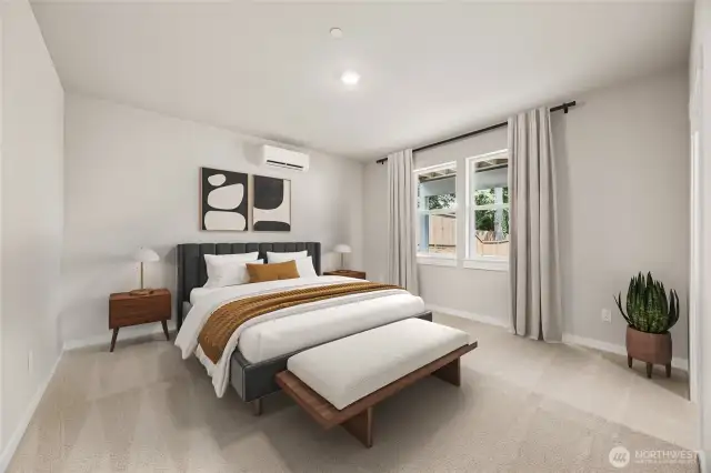 Large bedroom on lower level with large walk-in closet. This guest room can hold a king size mattress, end tables, and accent chair or sofa. Very large for guests. Photo of actual home with virtual staging.