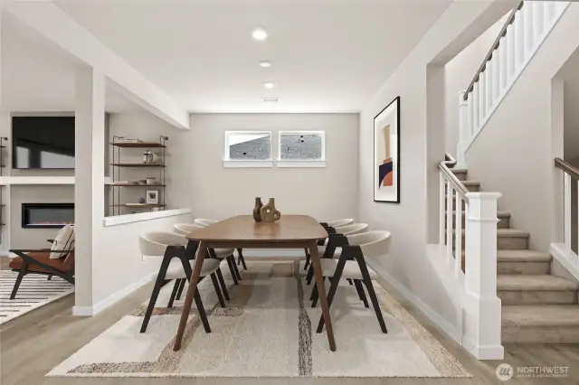 Large dining room area perfect for hosting dinner parties. Photo of actual home with virtual staging.