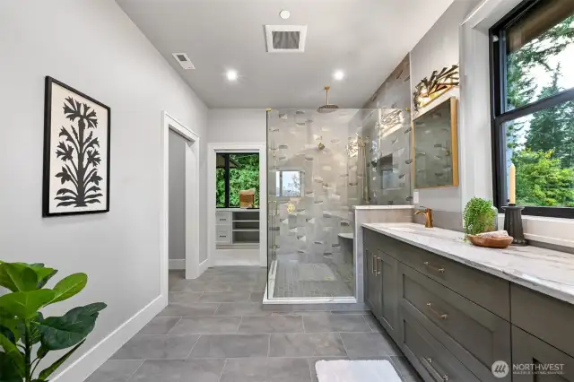 Spacious 2nd primary ensuite layout with second laundry area.