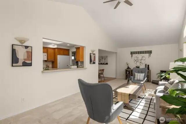 Family room w/ window/bar to the Kitchen