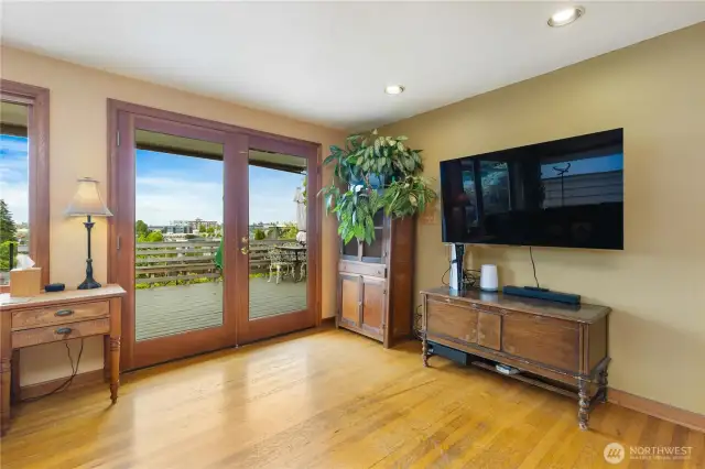 Spacious living area with abundant natural light and serene views.