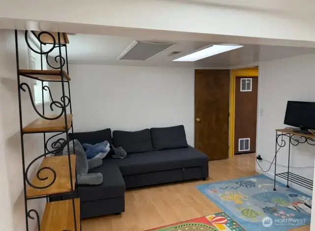 Her is big 3rd bedroom on lower level also with hard wood flooring and new paint that could be bonus room or media room