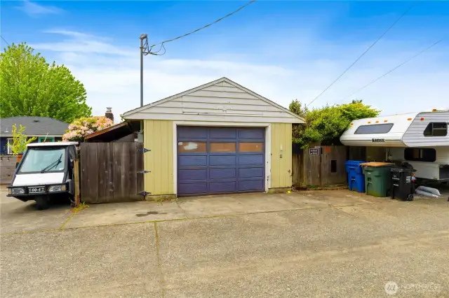 Level back alley access to home with detached garage shop and extra parking to enjoy