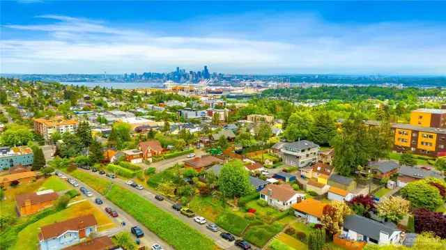 Look what views you have out back of home and from roof top towards everything in Seattle including Cascade mountain range and sunrises in the morning when your live here