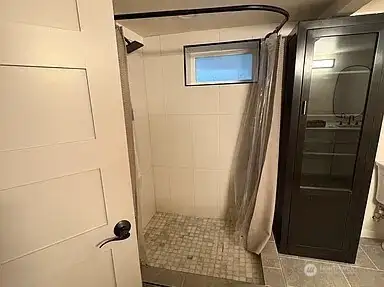 Primary Downstairs Huge Bathroom of Mudroom (right of stairs)