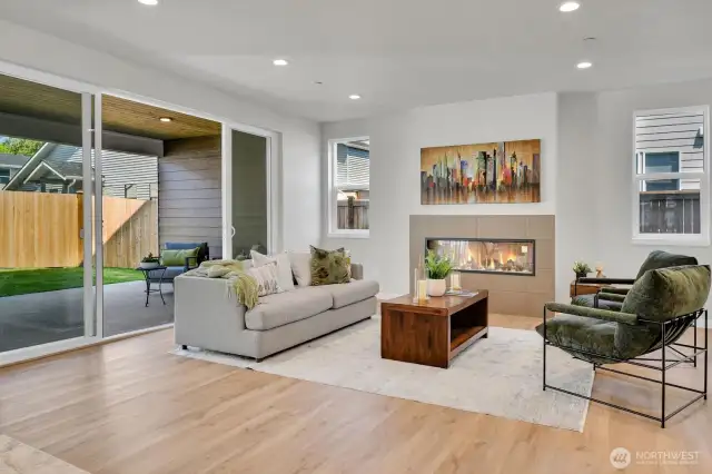 Double sliding doors from the living room invites you to the outdoor living room — ideal for year-round gatherings.