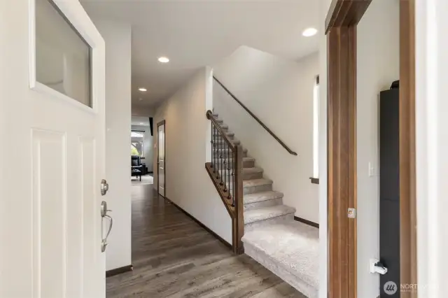 Entry with stairs on right and office/den to the right