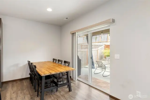 Dining room with sliding door to generous patio space