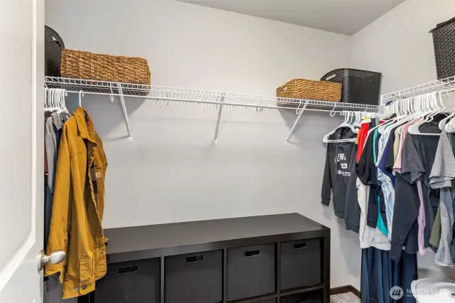 Spacious walk-in closet in primary bedroom