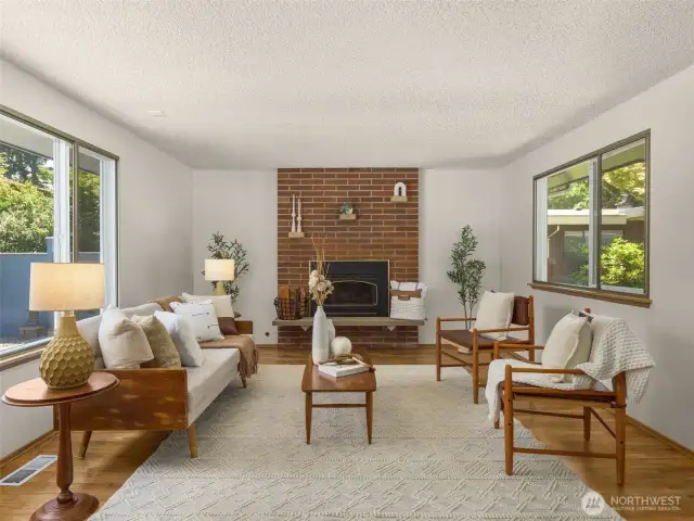 Living room includes gas fireplace. Gorgeous Red Oak floors.