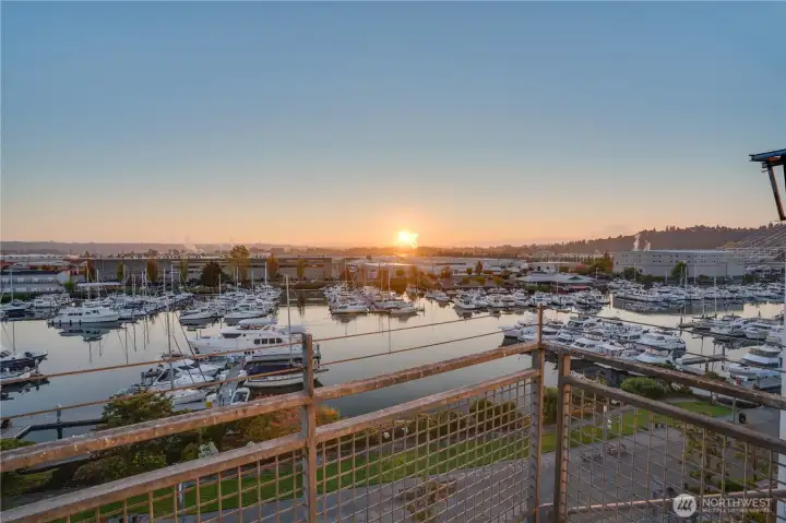 Top floor, 2-story condo. Starting the tour with your private balcony located off of the living room, overlooking Thea Foss Waterway. The sunrise, views of Mt. Rainier and boat activity never dull.