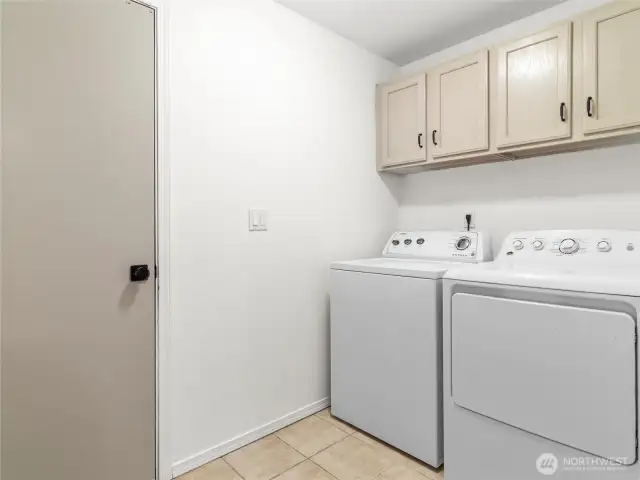 Great size laundry room and landing place from the garage.