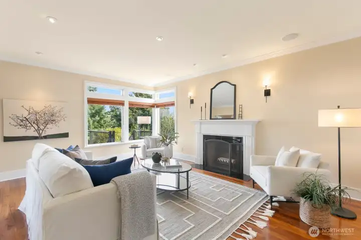 The main floor welcomes you with this gorgeous, formal living room. Note the SE corner windows that flood this floor with natural light.