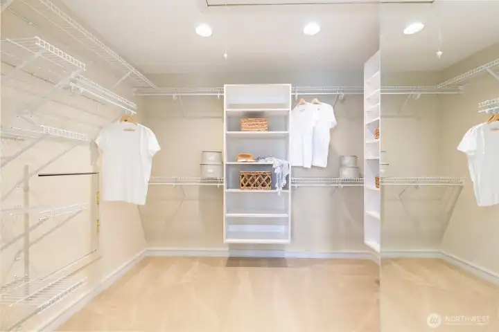 On the other end of the primary bath is this giant walk in closet. Two attic access points here as well as a washer/dryer hookup. Main laundry is on the lower level.