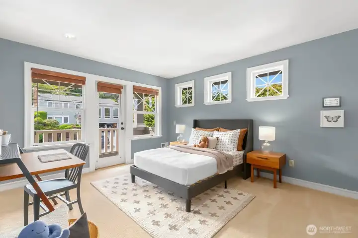 Also upstairs, you'll find this adorable second en-suite bedroom. This one has it's own west-facing balcony!
