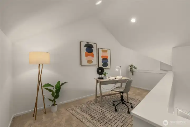 This cozy upstairs office/den is perfect for home office or work out area.