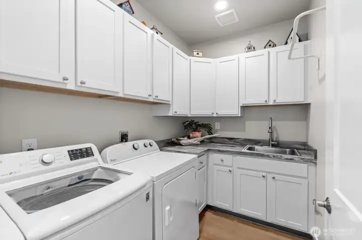 Spacious laundry room with tons of storage