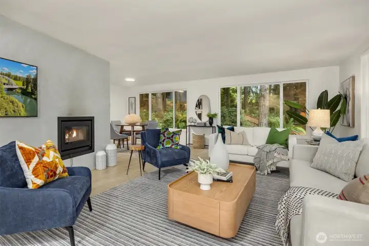Cozy up by the built-in wood-burning fireplace that anchors the living space with warmth and charm.