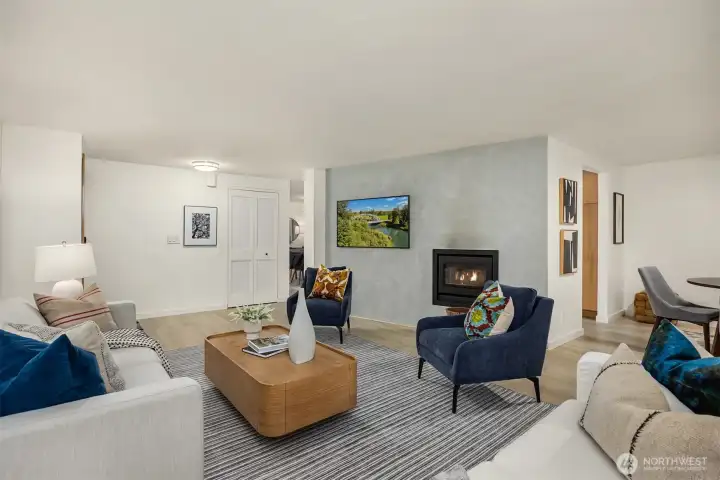The entry opens seamlessly into the spacious living area, perfect for gatherings.