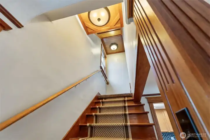 light fixtures and wood molding throughout.