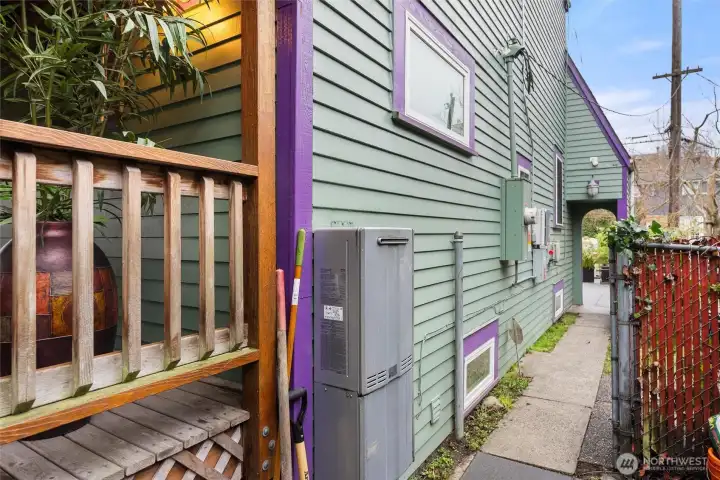 Tankless water heater on north side of home