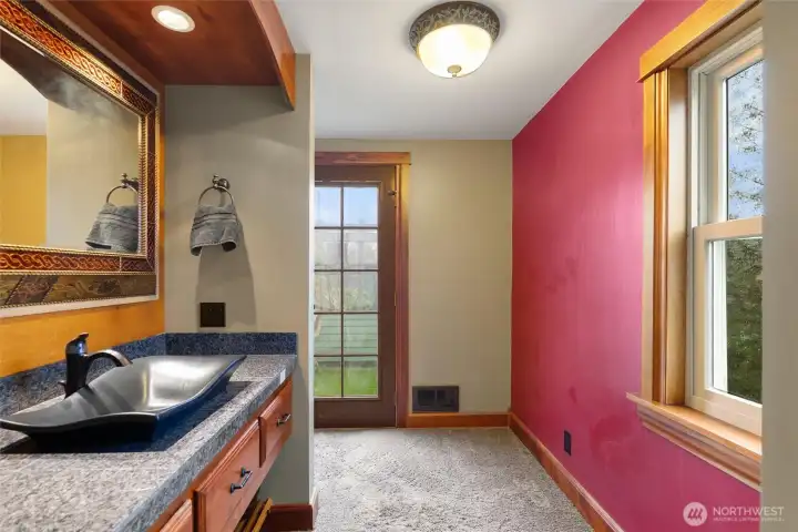 Master bedroom sink and access to upper deck