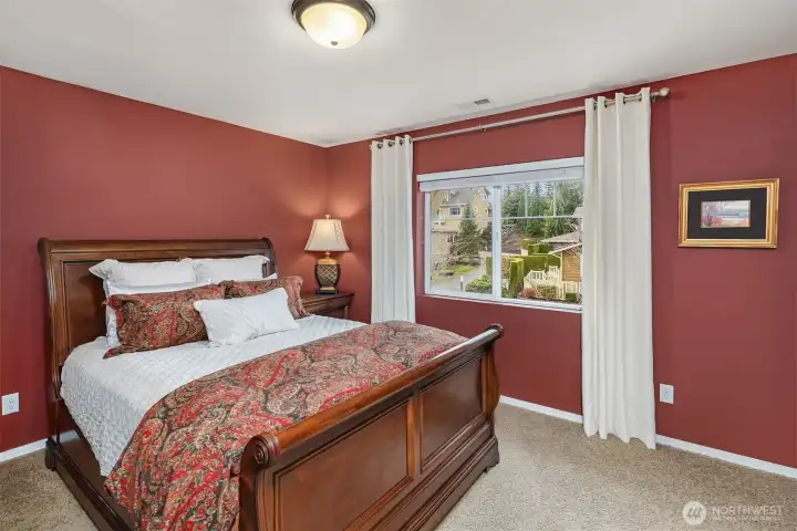 A second bedroom suite is just down the hall from the primary.