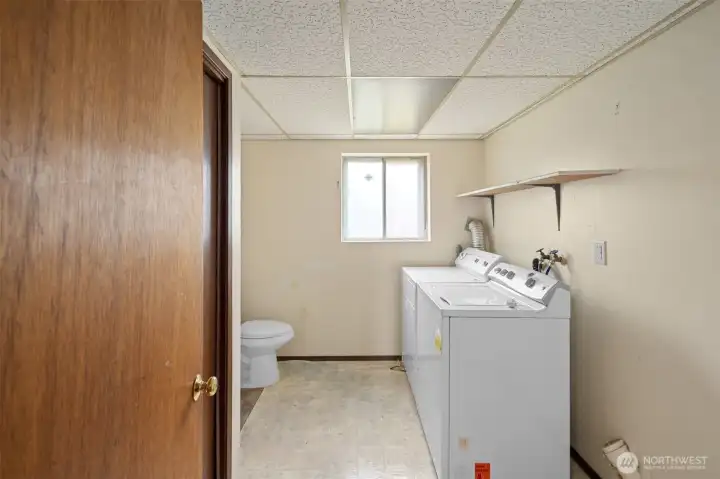 Utility room has more than enough space to add a shower!