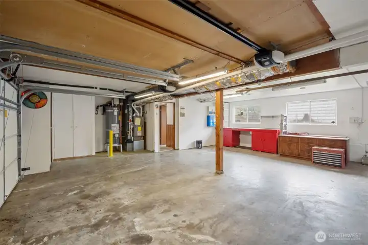 2 Car garage is oversized with great work space.