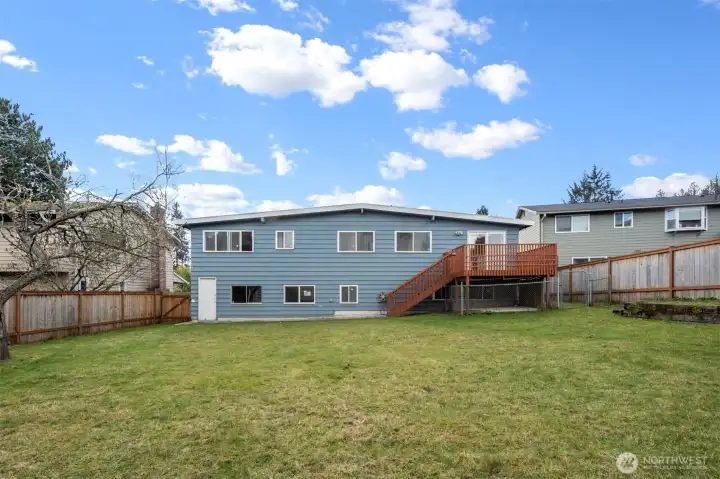 Slight slope in the back of this huge back yard.