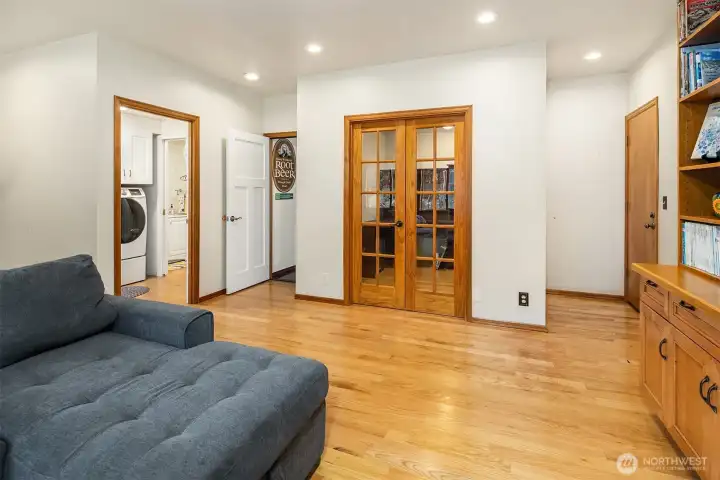 Attached to the family room are the french doors to the den/office.