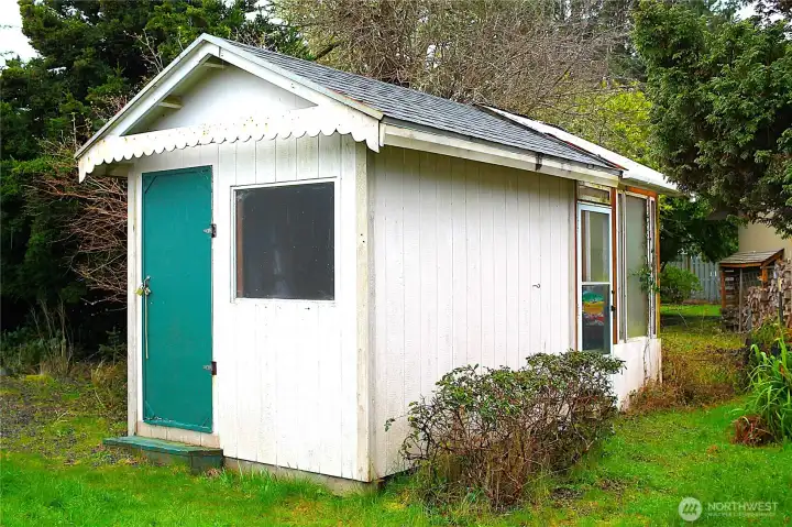 ---with an ample storage shed/greenhouse.
