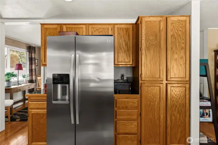 Tons of storage in the fridge and built in pantry.  All appliances stay!